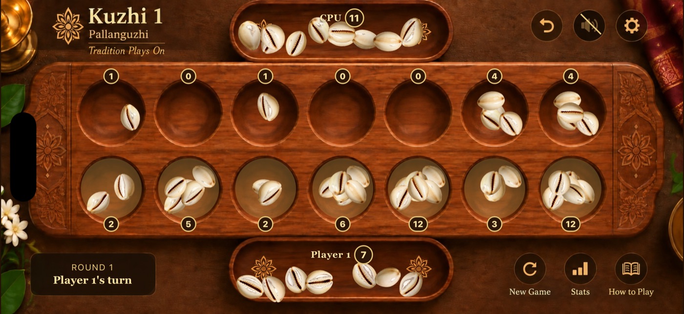 Kuzhi 1 mid-game with cowrie shell coins